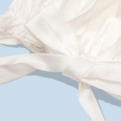 Bonnet en soie pure ajustable