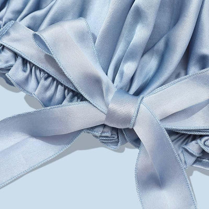 Bonnet en soie pure ajustable