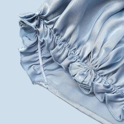 Bonnet en soie pure ajustable